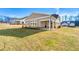 House exterior with backyard and landscaping at 2640 Joseph Dr, Cumming, GA 30028