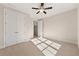 Bright bedroom with double doors and carpet flooring at 2640 Joseph Dr, Cumming, GA 30028