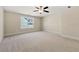 Well-lit bedroom with neutral walls and carpeted floors at 2640 Joseph Dr, Cumming, GA 30028