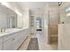 Spa-like bathroom with double vanity, walk-in shower, and ample storage at 2640 Joseph Dr, Cumming, GA 30028