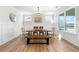 Spacious dining area with large windows and wood flooring at 2640 Joseph Dr, Cumming, GA 30028