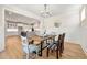 Open dining room with view into kitchen and hardwood floors at 2640 Joseph Dr, Cumming, GA 30028