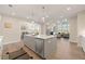 Open concept kitchen with island and breakfast bar at 2640 Joseph Dr, Cumming, GA 30028