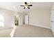 Spacious bedroom with carpet flooring and en-suite bathroom access at 2640 Joseph Dr, Cumming, GA 30028