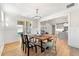 Bright dining room with a farmhouse table and wood floors at 2640 Joseph Dr, Cumming, GA 30028