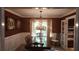 Elegant dining room with chandelier and chair rail at 2565 Binghamton Dr, Atlanta, GA 30360