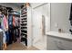 Large walk-in closet with custom shelving and ample storage space at 809 Kirby Dr, Woodstock, GA 30188