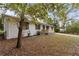 Charming ranch home with updated front porch and landscaping at 200 Sunrise Cir, Riverdale, GA 30274