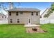 Spacious backyard with patio, fire pit, and storage shed at 6257 Selborn Sw Dr, Atlanta, GA 30331