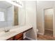 Bathroom with double vanity, tub, shower, and walk-in closet at 6257 Selborn Sw Dr, Atlanta, GA 30331