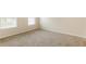Bright bedroom with neutral walls and carpeted floors at 6257 Selborn Sw Dr, Atlanta, GA 30331
