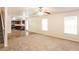 Open living room with carpet and kitchen views at 6257 Selborn Sw Dr, Atlanta, GA 30331