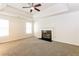Living room with tray ceiling, fireplace and carpet at 6257 Selborn Sw Dr, Atlanta, GA 30331