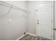 Laundry room with wire shelving and vinyl flooring at 2645 Sims Crest Ct, Snellville, GA 30078