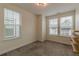 Bright bedroom with carpet flooring, built-in shelves, and ample natural light at 535 Hargrove Ln, Decatur, GA 30030