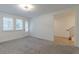 Spacious bedroom with grey carpet and access to stairs at 535 Hargrove Ln, Decatur, GA 30030