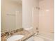 Clean bathroom with granite countertop, single sink, and shower/tub combo at 949 Heartwood Cir, Lawrenceville, GA 30043