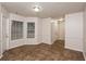 Dining area with tile floor, window and access to kitchen at 949 Heartwood Cir, Lawrenceville, GA 30043