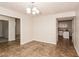Bright dining room with tile flooring and access to kitchen at 949 Heartwood Cir, Lawrenceville, GA 30043
