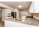Kitchen with granite countertops, stainless steel appliances, and breakfast bar at 949 Heartwood Cir, Lawrenceville, GA 30043