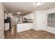 Eat-in kitchen with granite countertops and stainless steel appliances at 949 Heartwood Cir, Lawrenceville, GA 30043