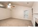 Bright living room featuring neutral carpet and a fireplace at 949 Heartwood Cir, Lawrenceville, GA 30043