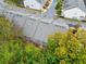 Townhome community viewed from above, showcasing rooftops and landscaping at 4429 Newfangle Rd, Stone Mountain, GA 30083
