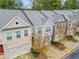 Townhome community with brick and siding exteriors at 4429 Newfangle Rd, Stone Mountain, GA 30083