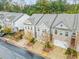 Townhome community with brick and siding exteriors at 4429 Newfangle Rd, Stone Mountain, GA 30083