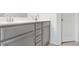 Double vanity with grey cabinets and silver hardware at 4429 Newfangle Rd, Stone Mountain, GA 30083