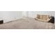 Spacious unfinished basement with neutral carpeting at 4429 Newfangle Rd, Stone Mountain, GA 30083