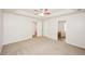Bright bedroom with neutral walls and carpeting, access to bathroom at 4112 Meadowlark Ct, Powder Springs, GA 30127