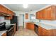 Modern kitchen with stainless steel appliances and granite countertops at 4112 Meadowlark Ct, Powder Springs, GA 30127
