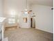 Open living room with vaulted ceiling and fireplace at 4112 Meadowlark Ct, Powder Springs, GA 30127