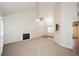 Spacious living room with vaulted ceiling, fireplace and carpet at 4112 Meadowlark Ct, Powder Springs, GA 30127