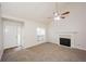 Living room featuring a fireplace and carpet at 4112 Meadowlark Ct, Powder Springs, GA 30127