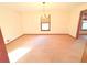 Bright dining room with a chandelier and large window at 1165 Plantation Dr, Villa Rica, GA 30180