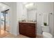 Modern bathroom with granite countertop and dark wood vanity at 3324 Peachtree Ne Rd # 2013, Atlanta, GA 30326