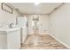 Laundry room includes a washer, dryer, and extra space for storage at 408 Gray Fox Dr, Canton, GA 30114