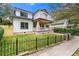 Two-story craftsman home with front porch and fenced yard at 116 3Rd Ave, Decatur, GA 30030