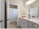 Clean bathroom with white vanity, a shower/tub combo, and tile flooring at 90 Hickory Pointe Dr, Acworth, GA 30101