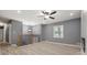 Living room with gray walls, fireplace, and hardwood floors at 1025 Buckhurst Dr, College Park, GA 30349