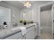 Double vanity bathroom with granite countertop and separate tub at 197 Stafford Ln, Villa Rica, GA 30180