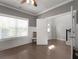 Bright living room with hardwood floors, large windows, and neutral color palette at 197 Stafford Ln, Villa Rica, GA 30180