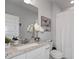 Clean bathroom with granite countertop, white vanity, and shower/tub combo at 197 Stafford Ln, Villa Rica, GA 30180