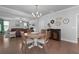 Charming dining room with wood table and view into the living room at 197 Stafford Ln, Villa Rica, GA 30180