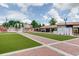 Town square with artificial turf, brick pathways, and a splash pad at 995 Whitehead Rd, Sugar Hill, GA 30518