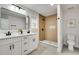 Clean bathroom features a walk-in shower with wood-look tile at 1078 Hobson Sw St, Atlanta, GA 30310