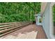 Spacious deck overlooking wooded area, perfect for outdoor enjoyment at 1674 Rocky Top Sw Dr, Lilburn, GA 30047