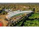 Aerial view of modern school building with surrounding trees and athletic fields at 130 2Nd Se Ave, Atlanta, GA 30317